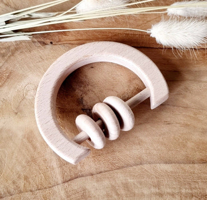 Holzrassel für Babys in Hufeisenform aus Holz
